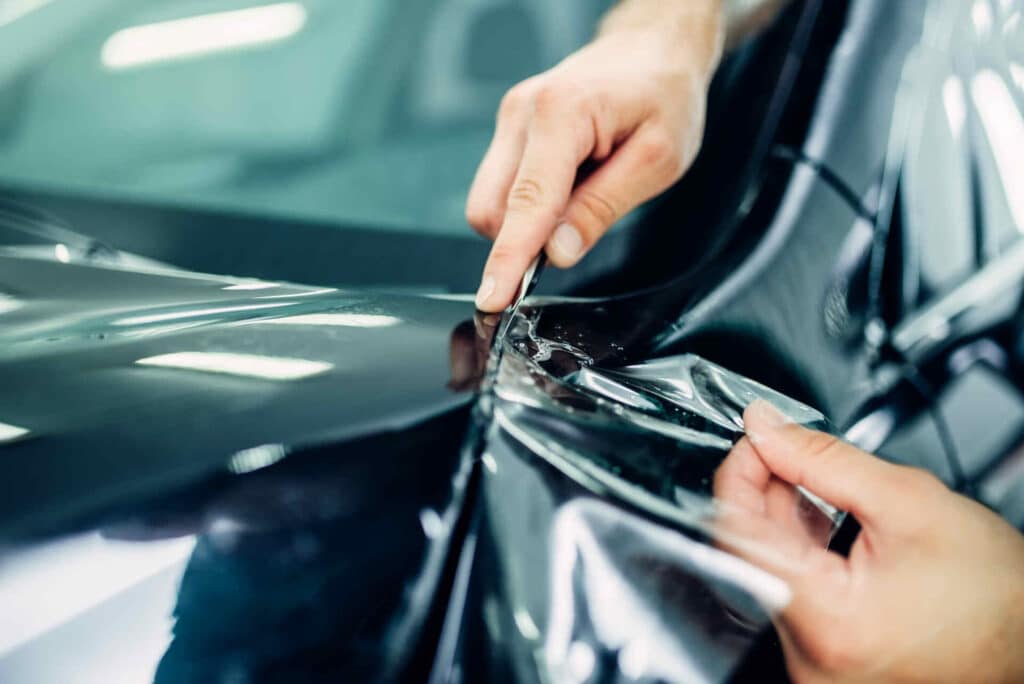 Paint protection film being installed on a vehicle in NJ